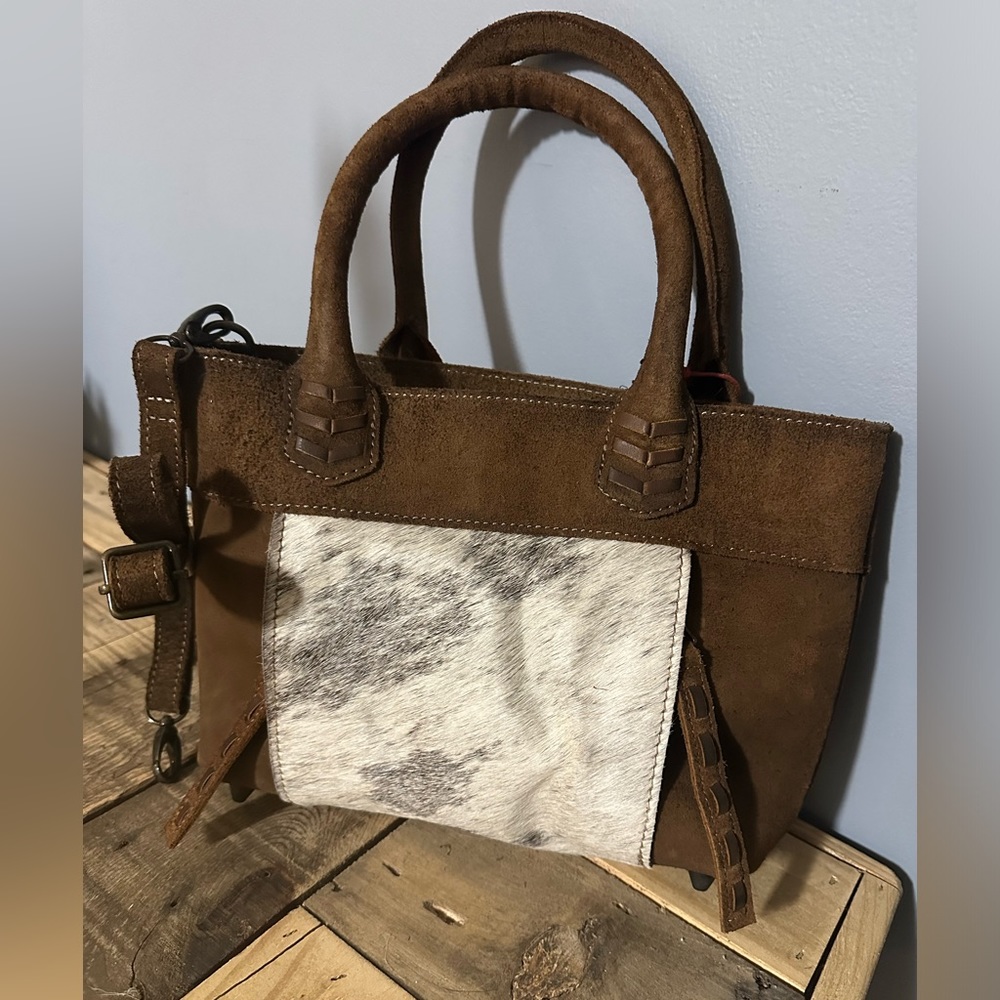 STS Ranchwear genuine leather and cowhide conceal carry purse.